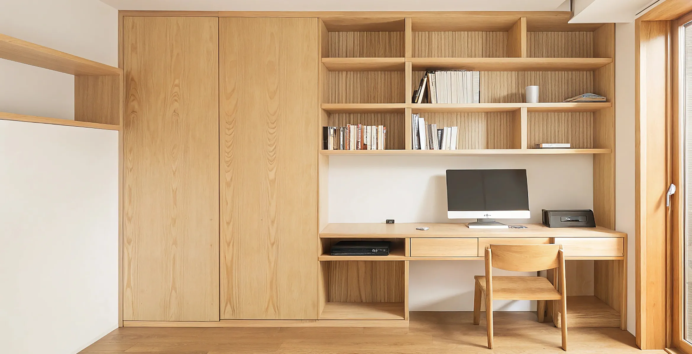 Custom home office addition in Dallas TX featuring built-in wood cabinetry, integrated desk workspace, open shelving, and a minimalist modern design with natural light